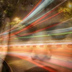 face behind streaks of light