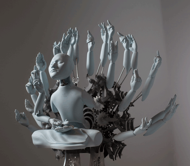 image of sculpture with many hands